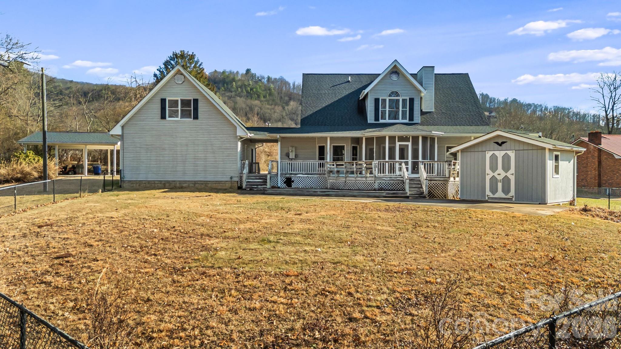 427 McCoy Cove Road Black Mountain, NC 28711 - Photo 35 of 47 a front view of a house with a yard