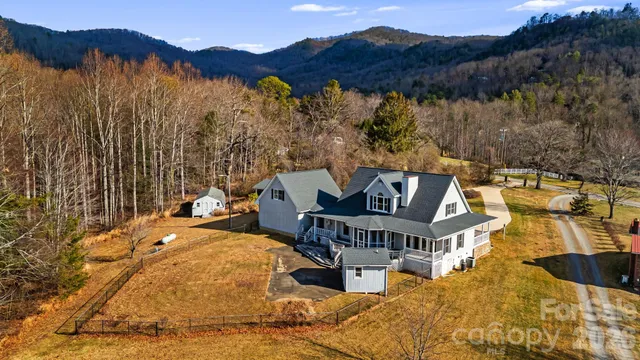 a view of a terrace with a table and chairs with wooden floor