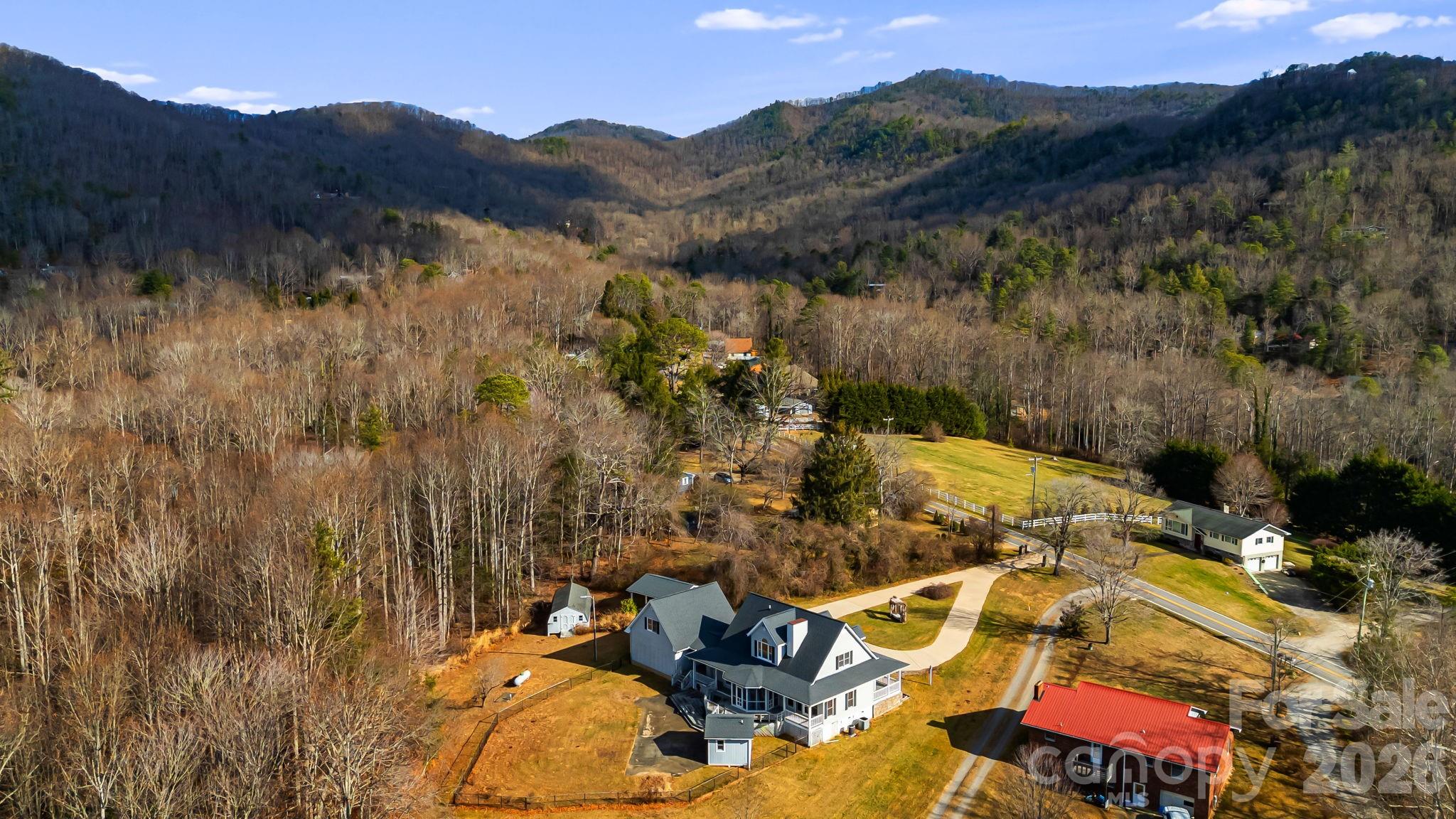 427 McCoy Cove Road Black Mountain, NC 28711 - Photo 43 of 47 a view of a houses with a yard