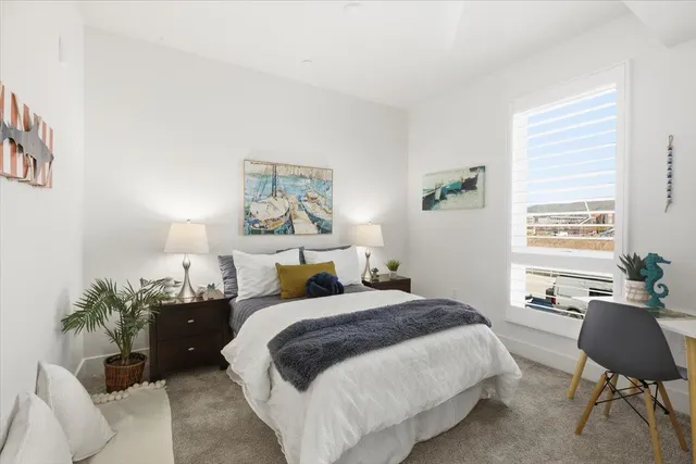 a work room with furniture and potted plant