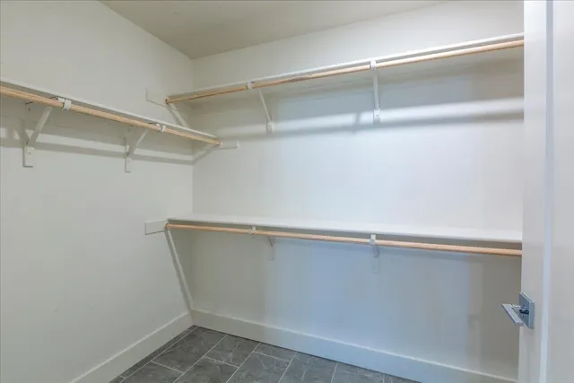 a view of a patio with a table and chairs in patio