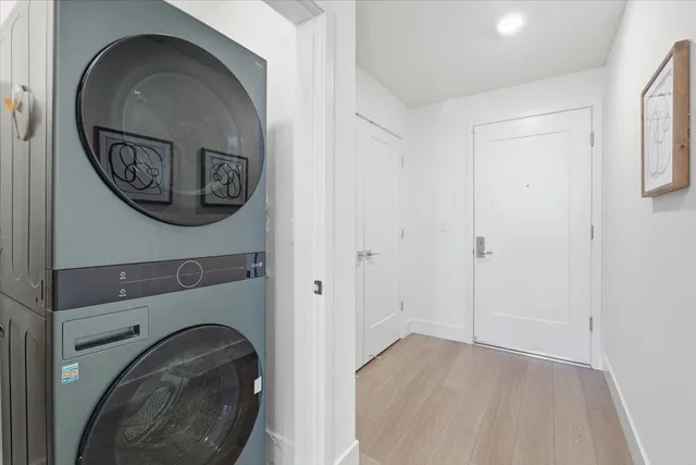 a view of a balcony dining table and chairs