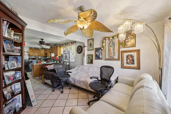 a living room with furniture and a window