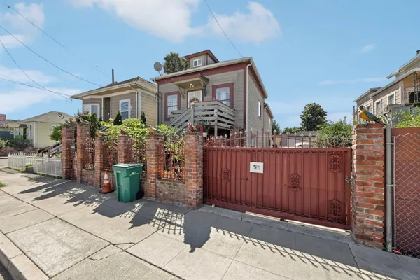 a front view of a house with parking space