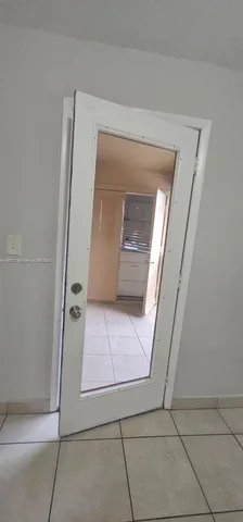 a bathroom with a bathtub and a toilet