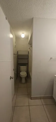 a bathroom with a toilet