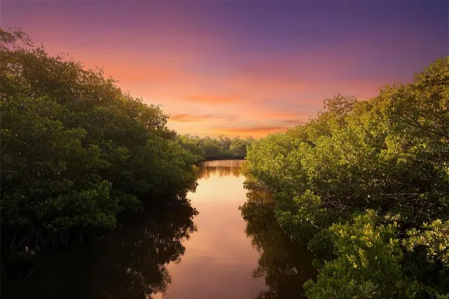 a view of a lake from a balcony