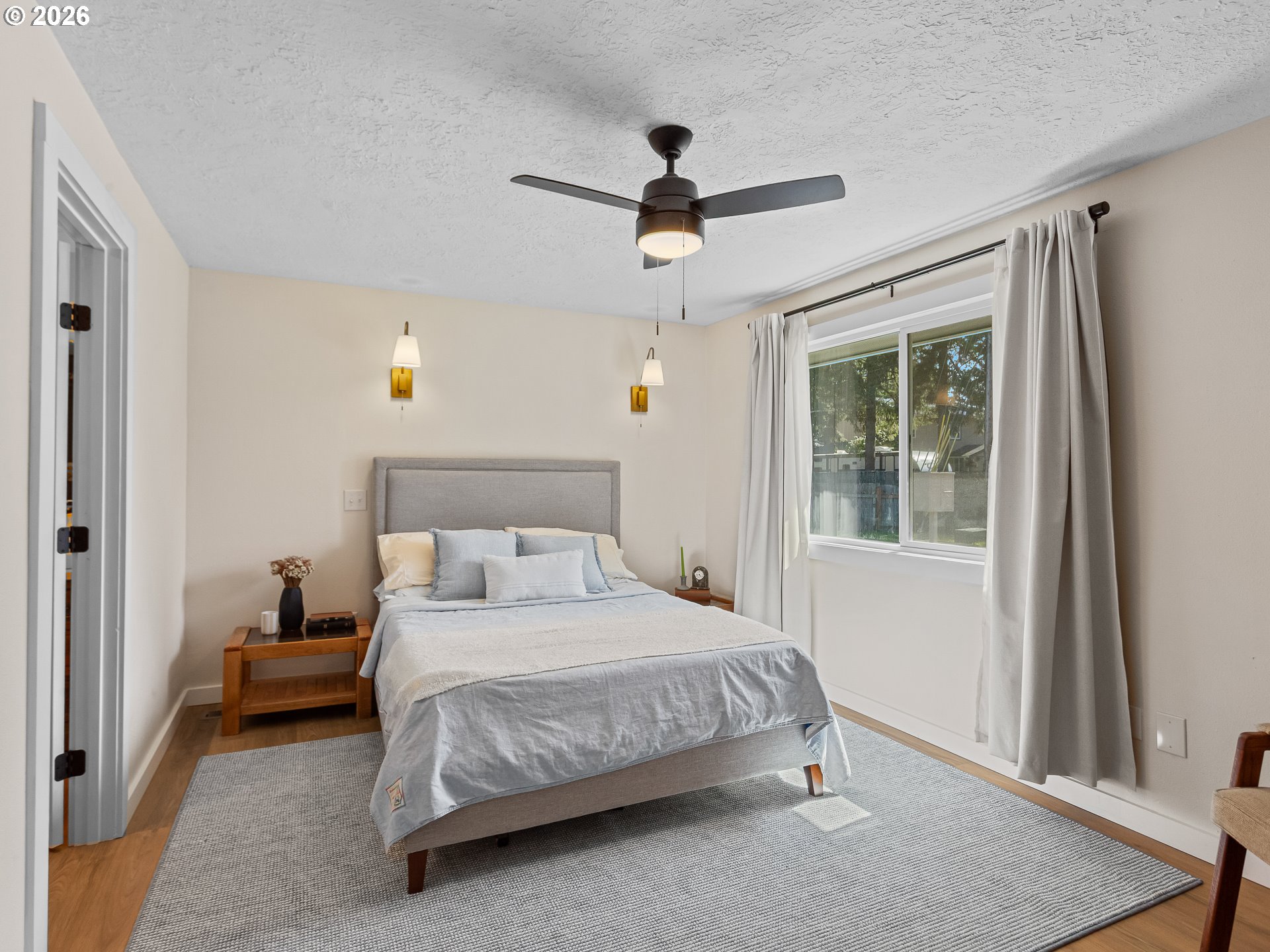 20149 Northeast Oregon Street Fairview, OR 97024 - Photo 19 of 37 a bedroom with a bed and a window