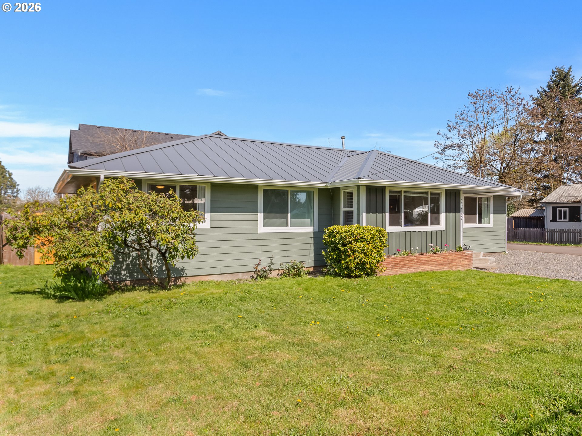 20149 Northeast Oregon Street Fairview, OR 97024 - Photo 2 of 37 a view of a house with a yard and sitting area