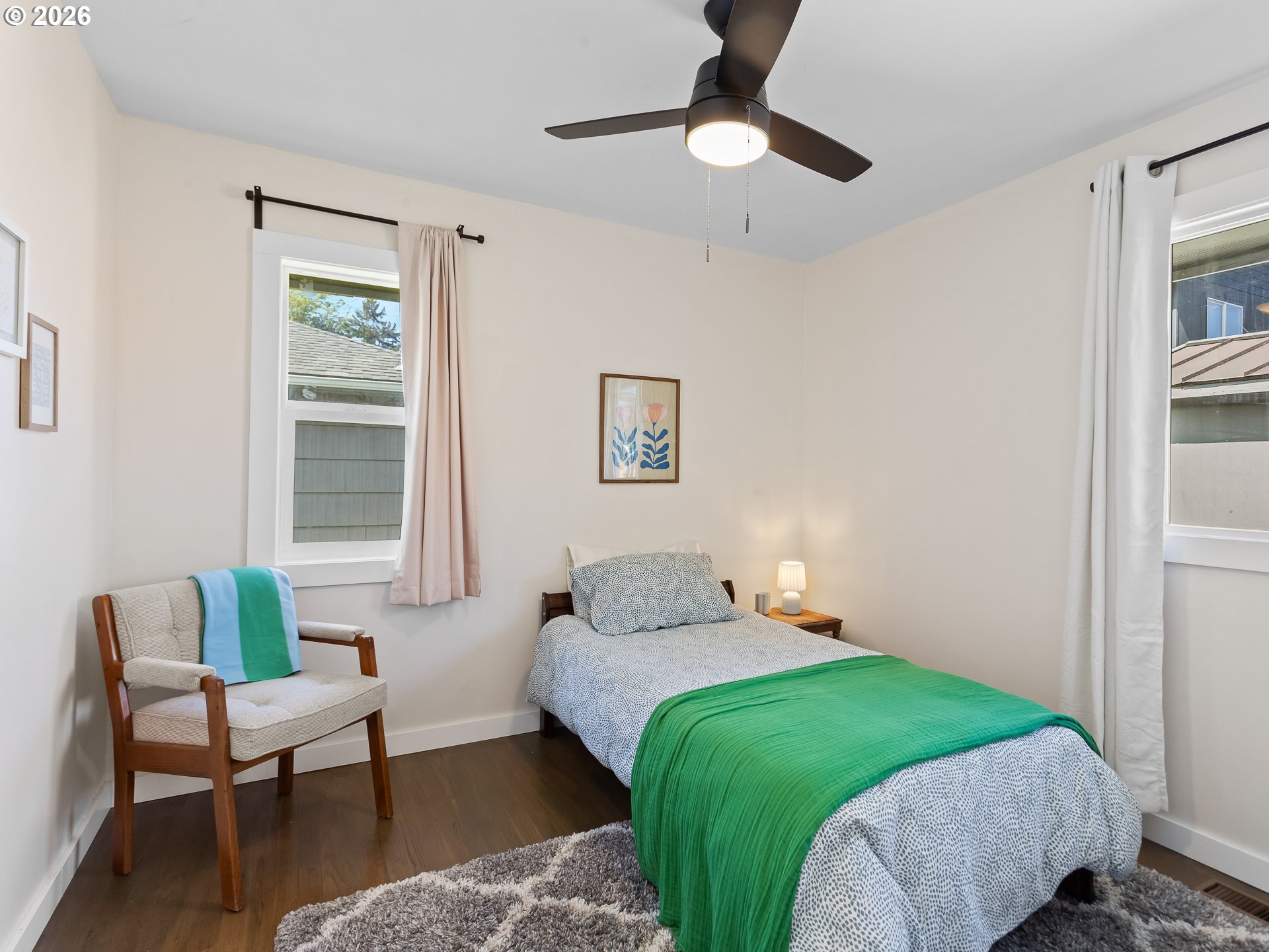 20149 Northeast Oregon Street Fairview, OR 97024 - Photo 29 of 37 a bedroom with a bed furniture and a window