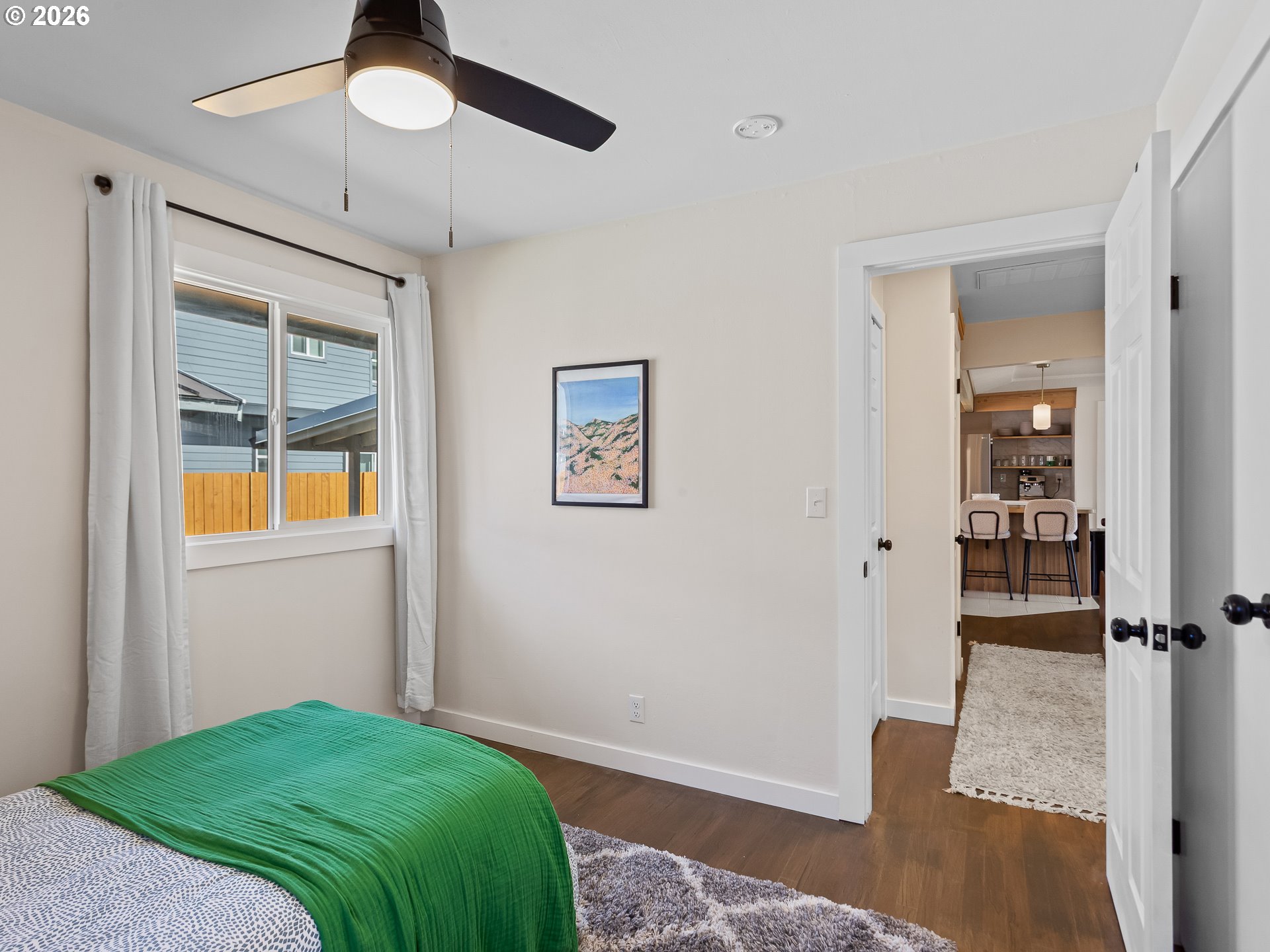 20149 Northeast Oregon Street Fairview, OR 97024 - Photo 30 of 37 a bedroom with a bed and a window