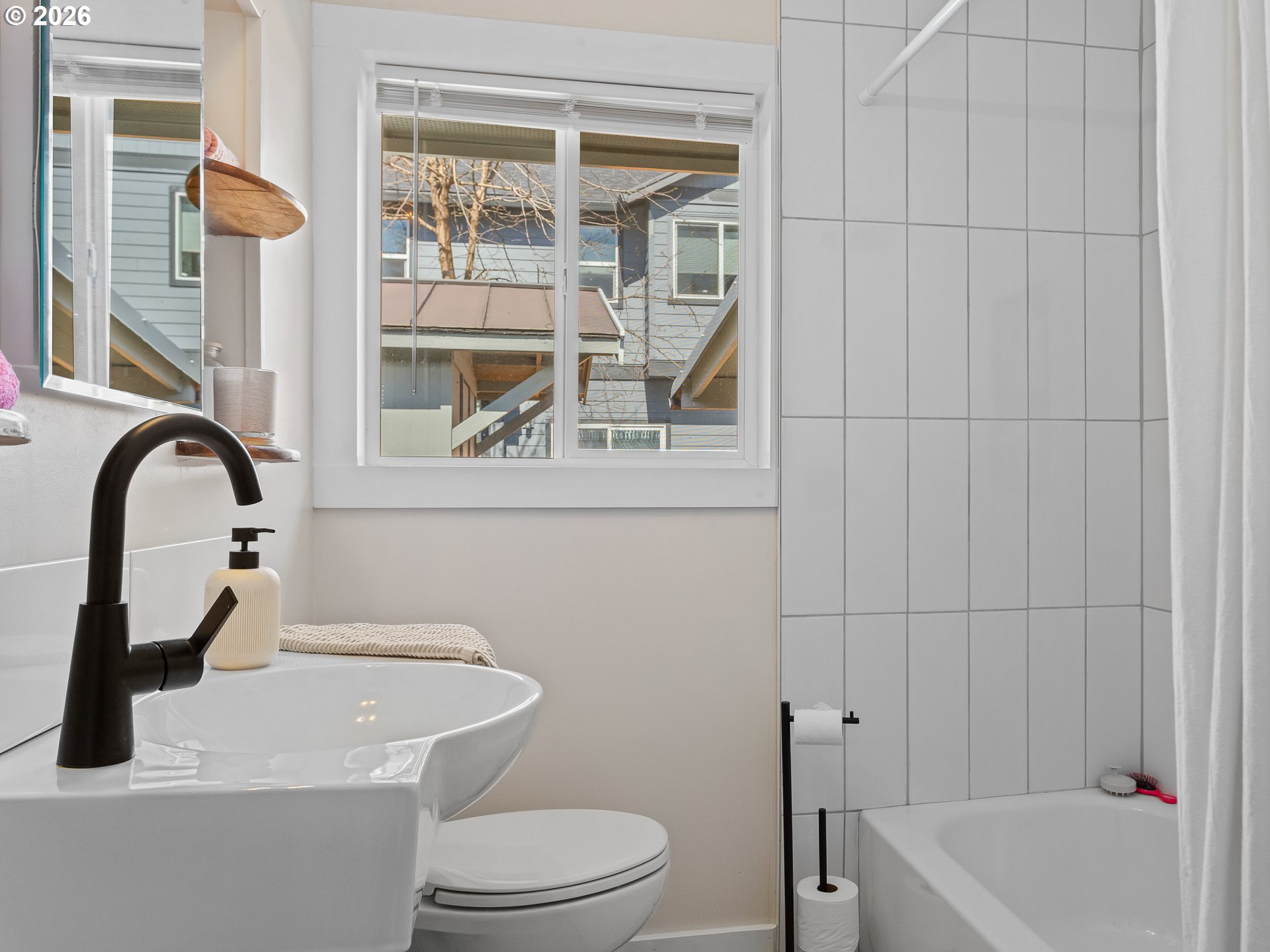 20149 Northeast Oregon Street Fairview, OR 97024 - Photo 31 of 37 a bathroom with a sink a toilet and a shower