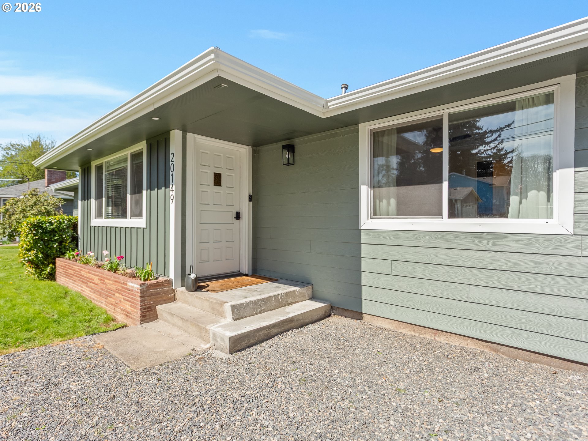 20149 Northeast Oregon Street Fairview, OR 97024 - Photo 4 of 37 a front view of a house with a yard