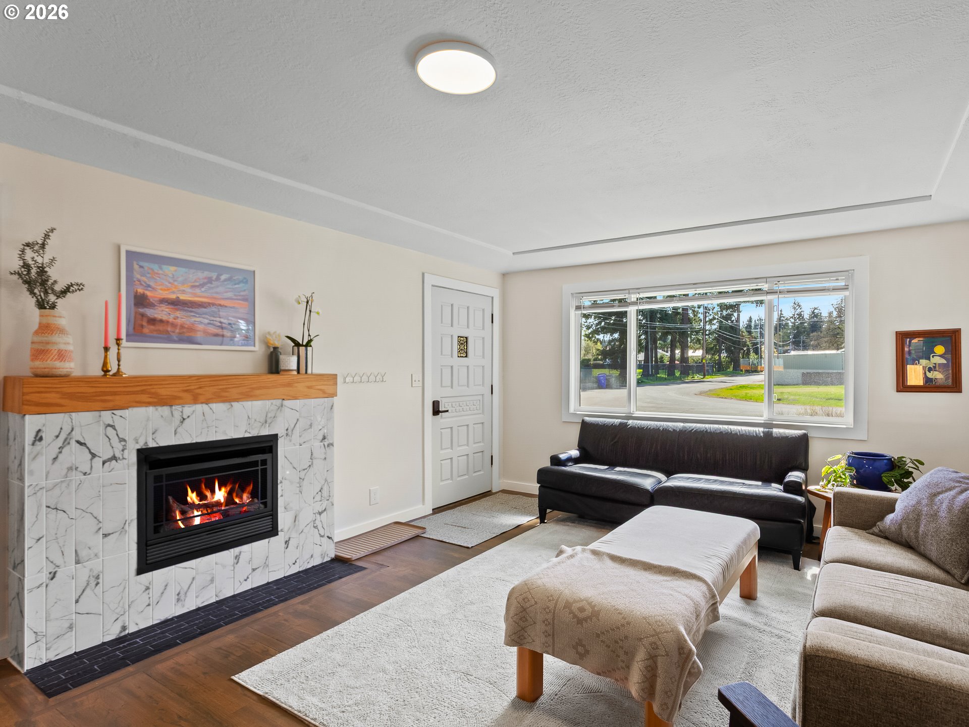 20149 Northeast Oregon Street Fairview, OR 97024 - Photo 6 of 37 a living room with furniture and a fireplace