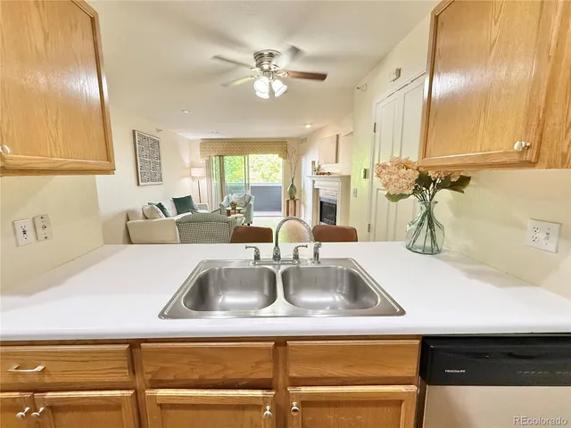 a kitchen with a sink and a window