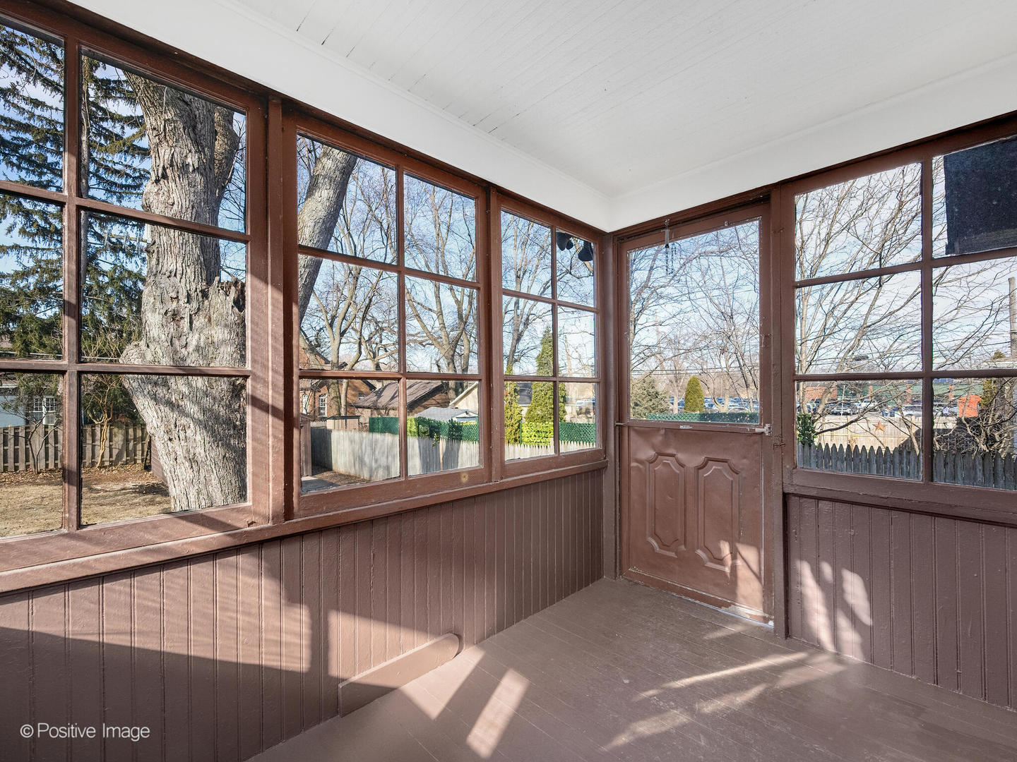 108 South Park Road La Grange, IL 60525 - Photo 10 of 20 a view of an empty room with wooden floor and a window
