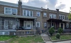 143 Eutaw Avenue Camden, NJ 08105 - Photo 1 of 1 front view of house with a yard
