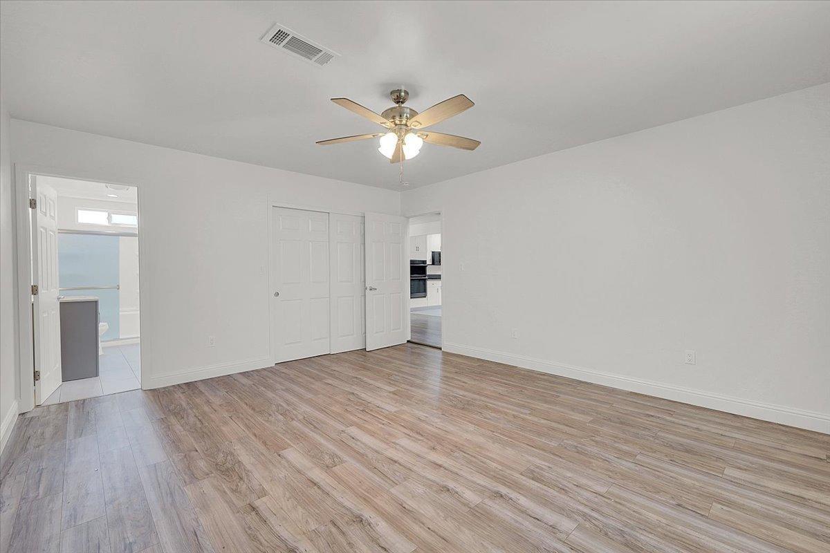 2473 Date Street Live Oak, CA 95953 - Photo 23 of 27 a view of empty room with wooden floor