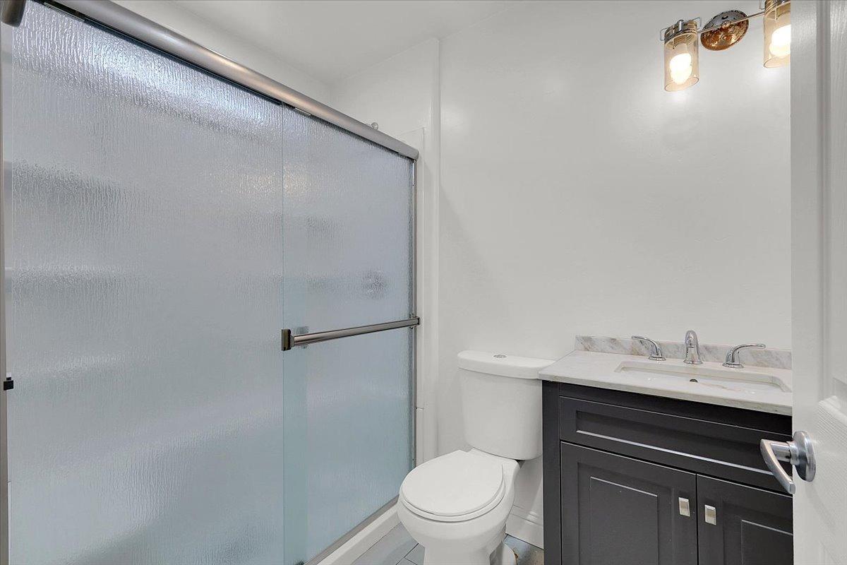 2473 Date Street Live Oak, CA 95953 - Photo 10 of 27 a bathroom with a sink a toilet and shower