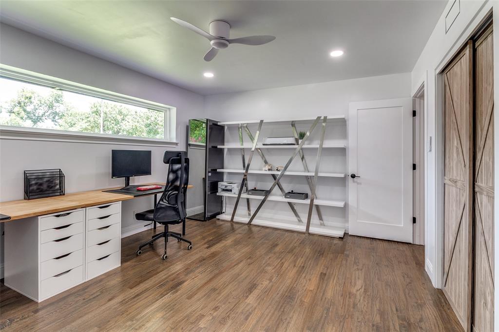 7127 East Mockingbird Lane Dallas, TX 75214 - Photo 18 of 31 a view of a workspace with furniture and a window