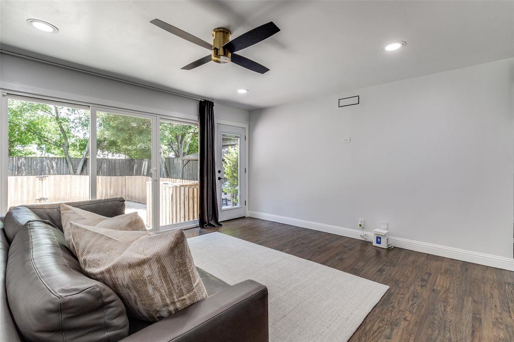 7127 East Mockingbird Lane Dallas, TX 75214 - Photo 21 of 31 a living room with furniture and a large window
