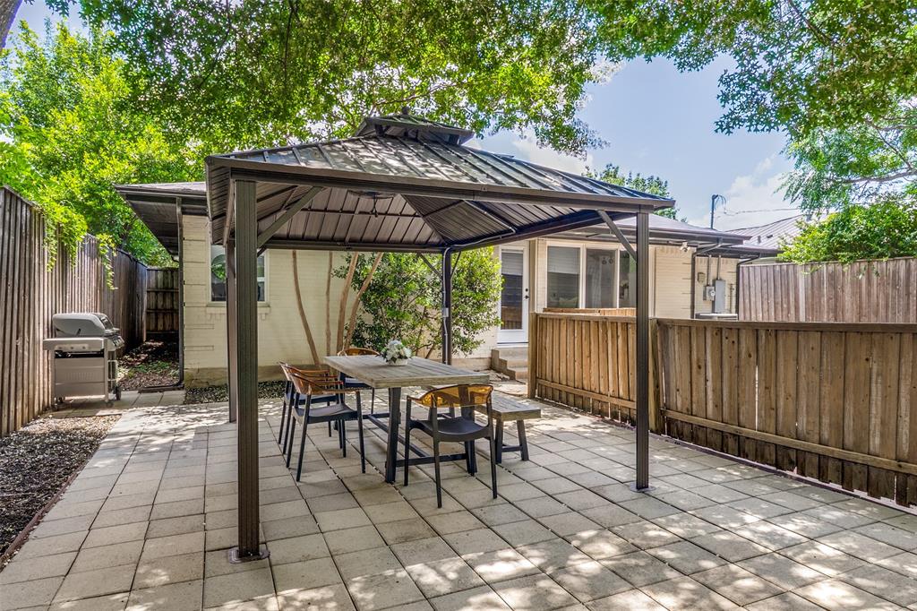 7127 East Mockingbird Lane Dallas, TX 75214 - Photo 25 of 31 a patio with glass top table and chairs