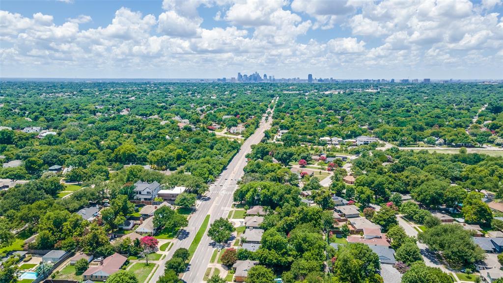 7127 East Mockingbird Lane Dallas, TX 75214 - Photo 29 of 31 a view of a city with lush green forest