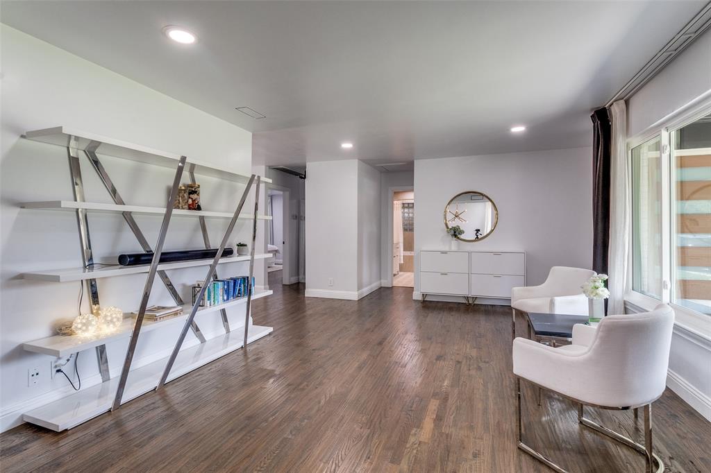 7127 East Mockingbird Lane Dallas, TX 75214 - Photo 5 of 31 a living room with furniture and a wooden floor