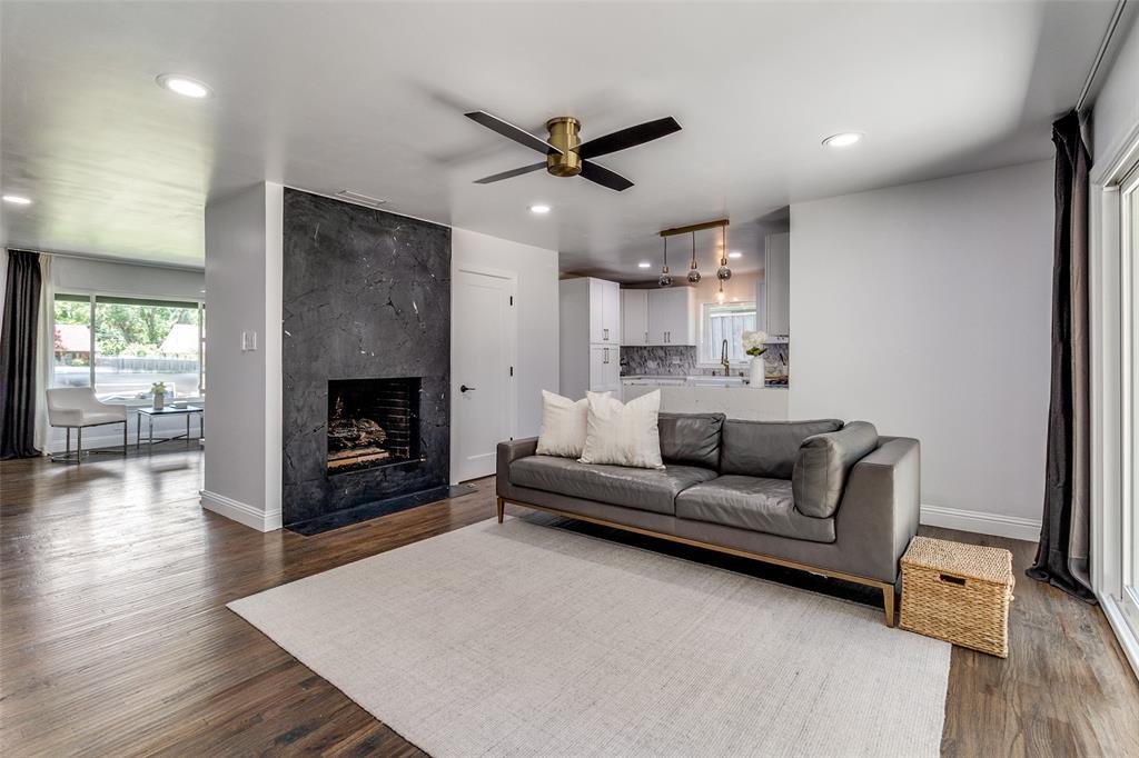 7127 East Mockingbird Lane Dallas, TX 75214 - Photo 9 of 31 a living room with furniture and a fireplace