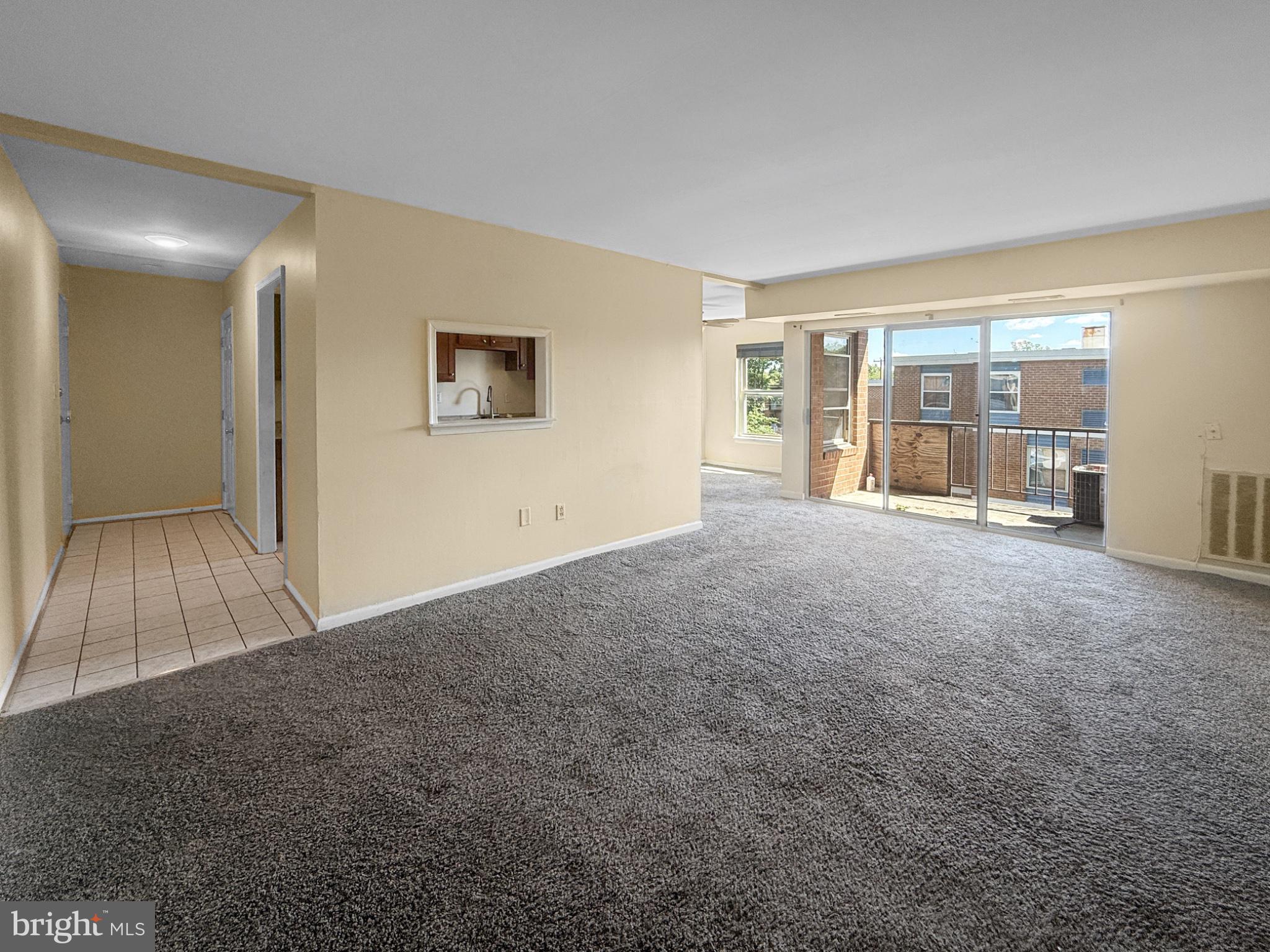 3807 St Barnabas Road, Unit 203 Suitland, MD 20746 - Photo 6 of 23 Spacious living area with natural light.