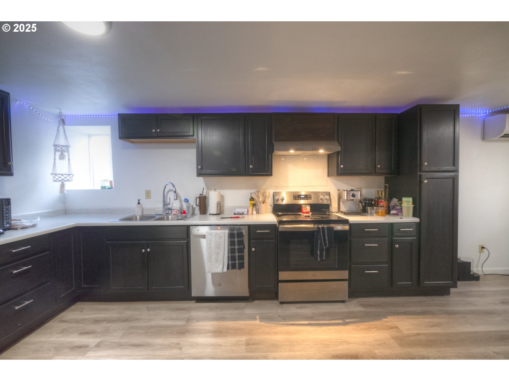 415 Southwest 7th Street Pendleton, OR 97801 - Photo 41 of 44 a kitchen with stainless steel appliances granite countertop a sink and cabinets