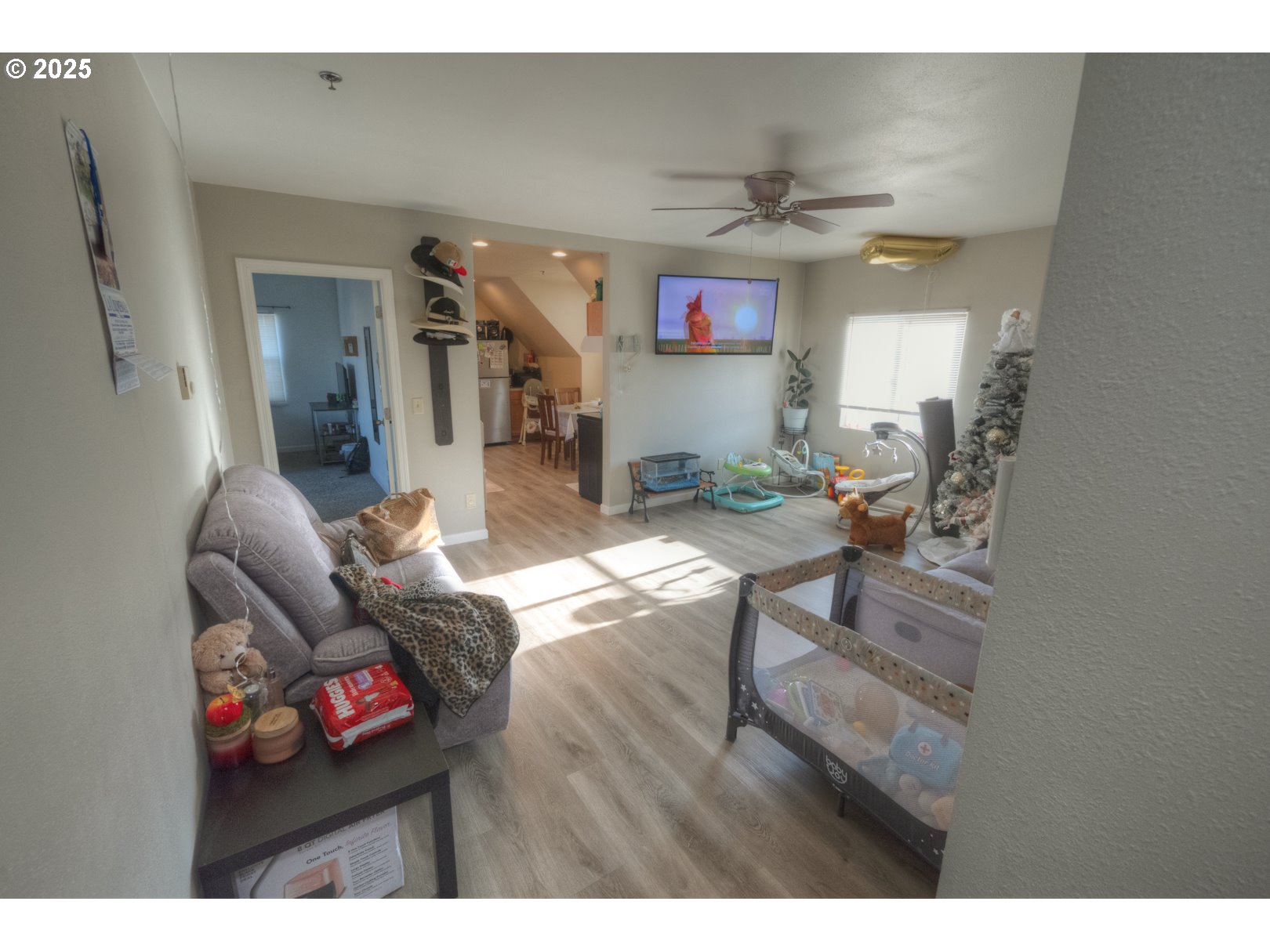 415 Southwest 7th Street Pendleton, OR 97801 - Photo 7 of 44 a living room with furniture and a flat screen tv