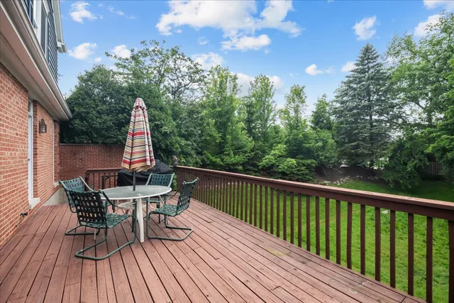 a view of roof deck with patio