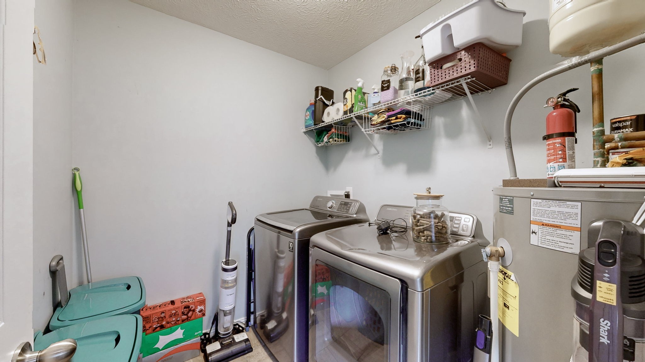 1462 East Ab Wade Road Portland, TN 37148 - Photo 16 of 52 a utility room with dryer and washer