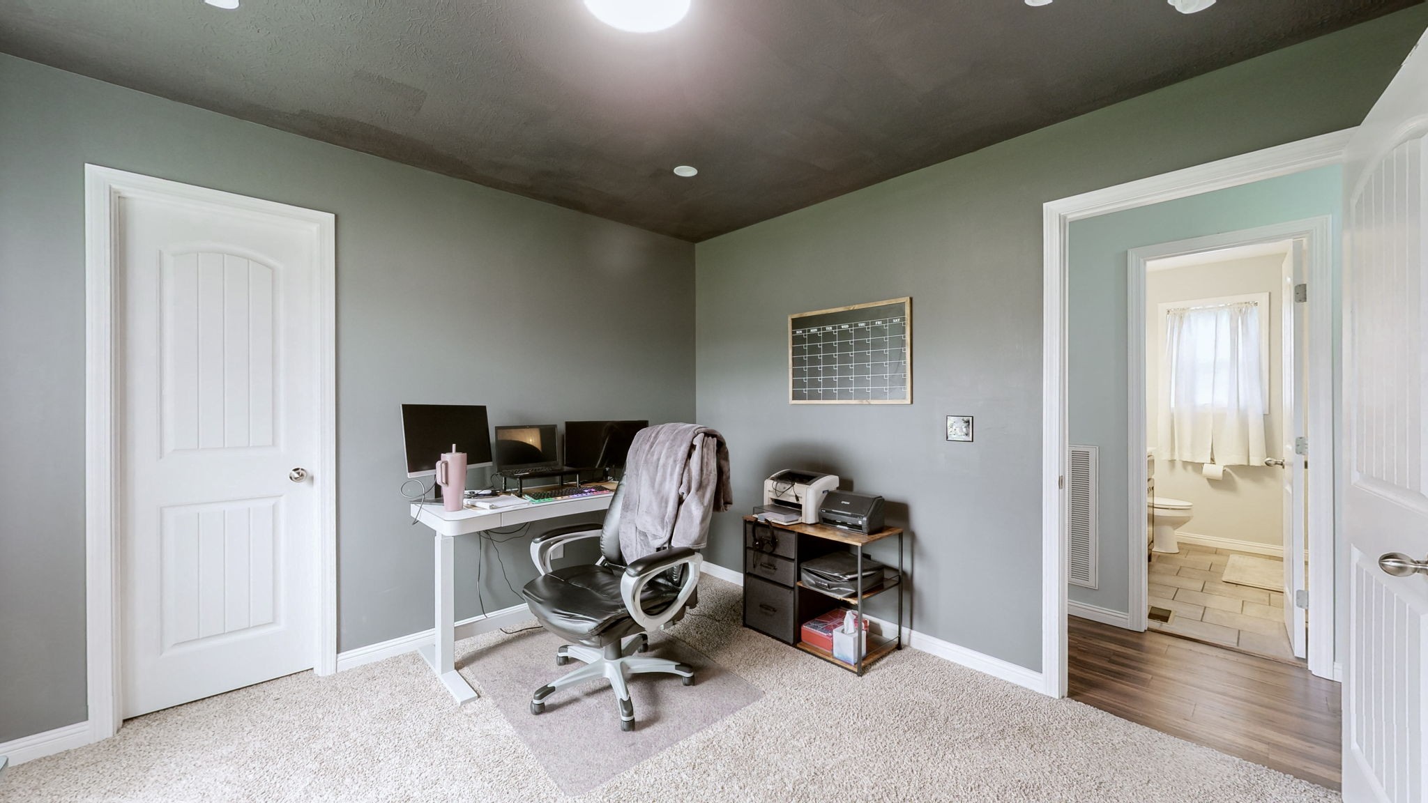 1462 East Ab Wade Road Portland, TN 37148 - Photo 24 of 52 a view of a workspace with furniture and a window