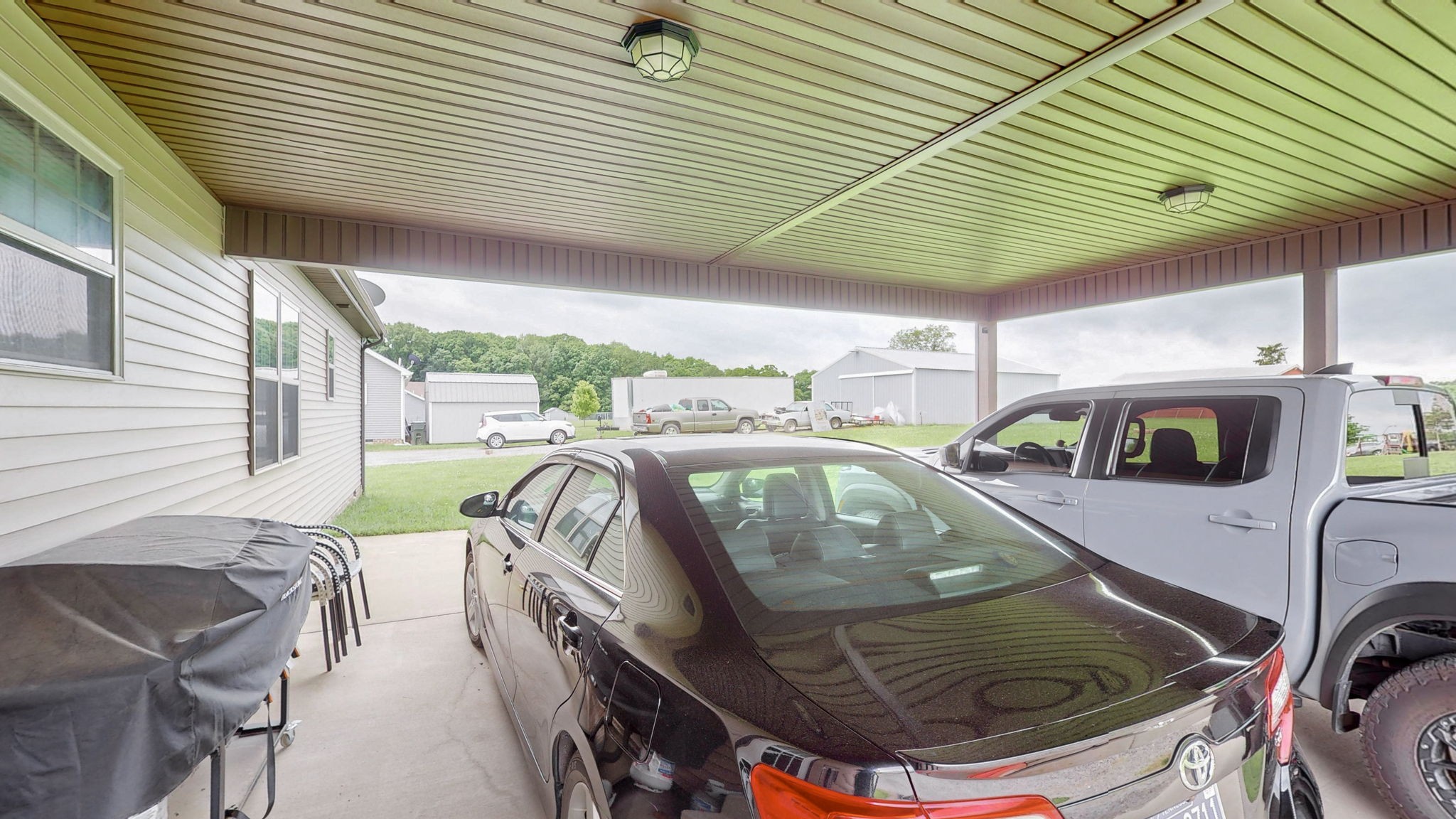 1462 East Ab Wade Road Portland, TN 37148 - Photo 30 of 52 a view of a patio and fire pit