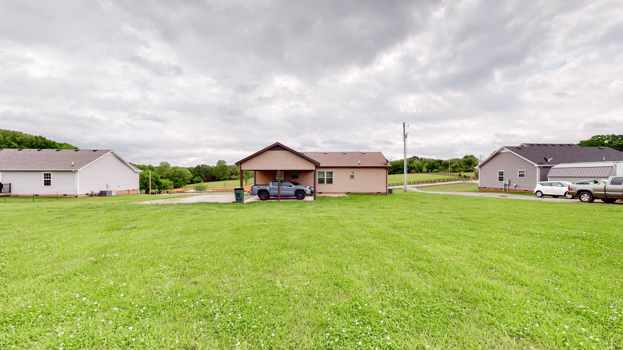 1462 East Ab Wade Road Portland, TN 37148 - Photo 33 of 52 a front view of house with yard and car parked