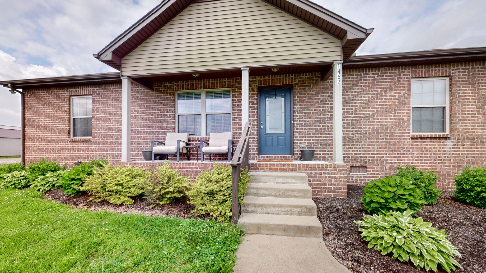 1462 East Ab Wade Road Portland, TN 37148 - Photo 37 of 52 a view of a house with potted plants