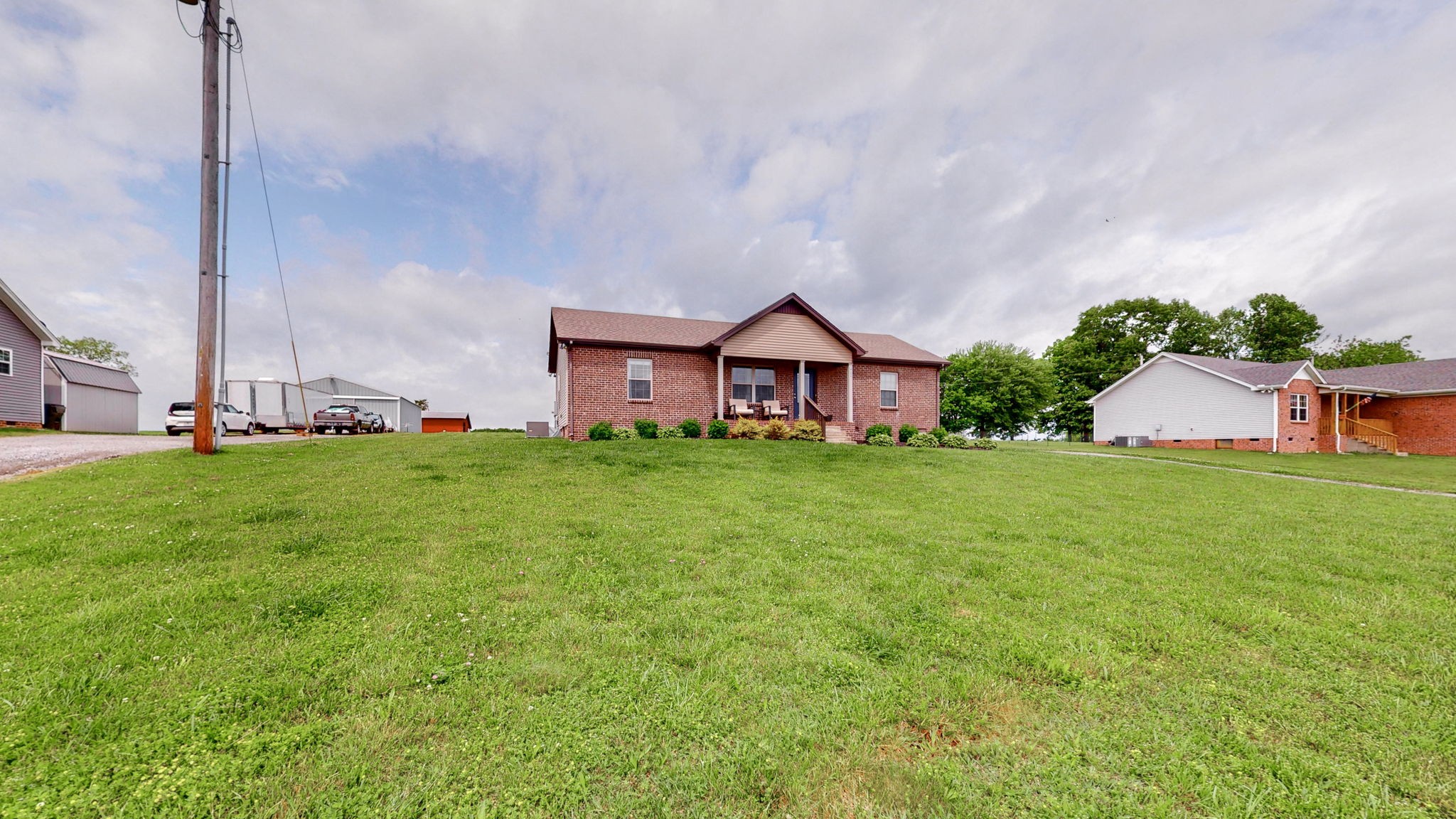1462 East Ab Wade Road Portland, TN 37148 - Photo 39 of 52 a front view of a house with garden