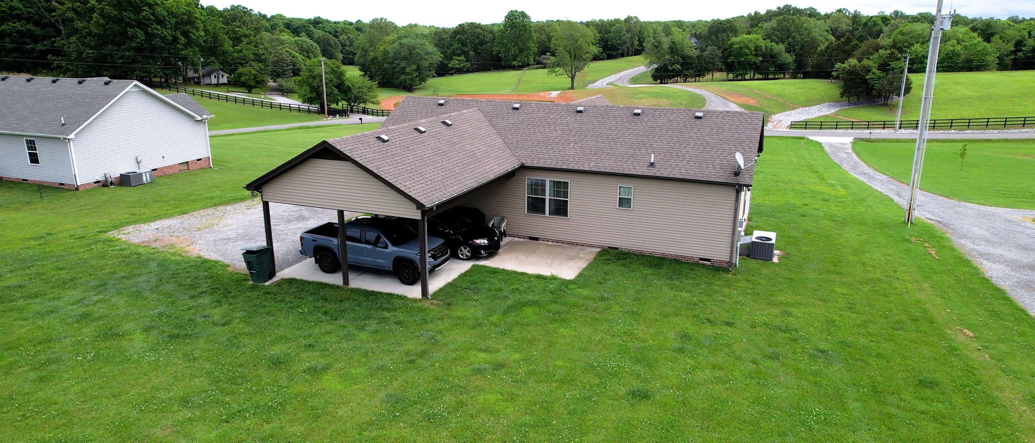 1462 East Ab Wade Road Portland, TN 37148 - Photo 48 of 52 a aerial view of a house with garden