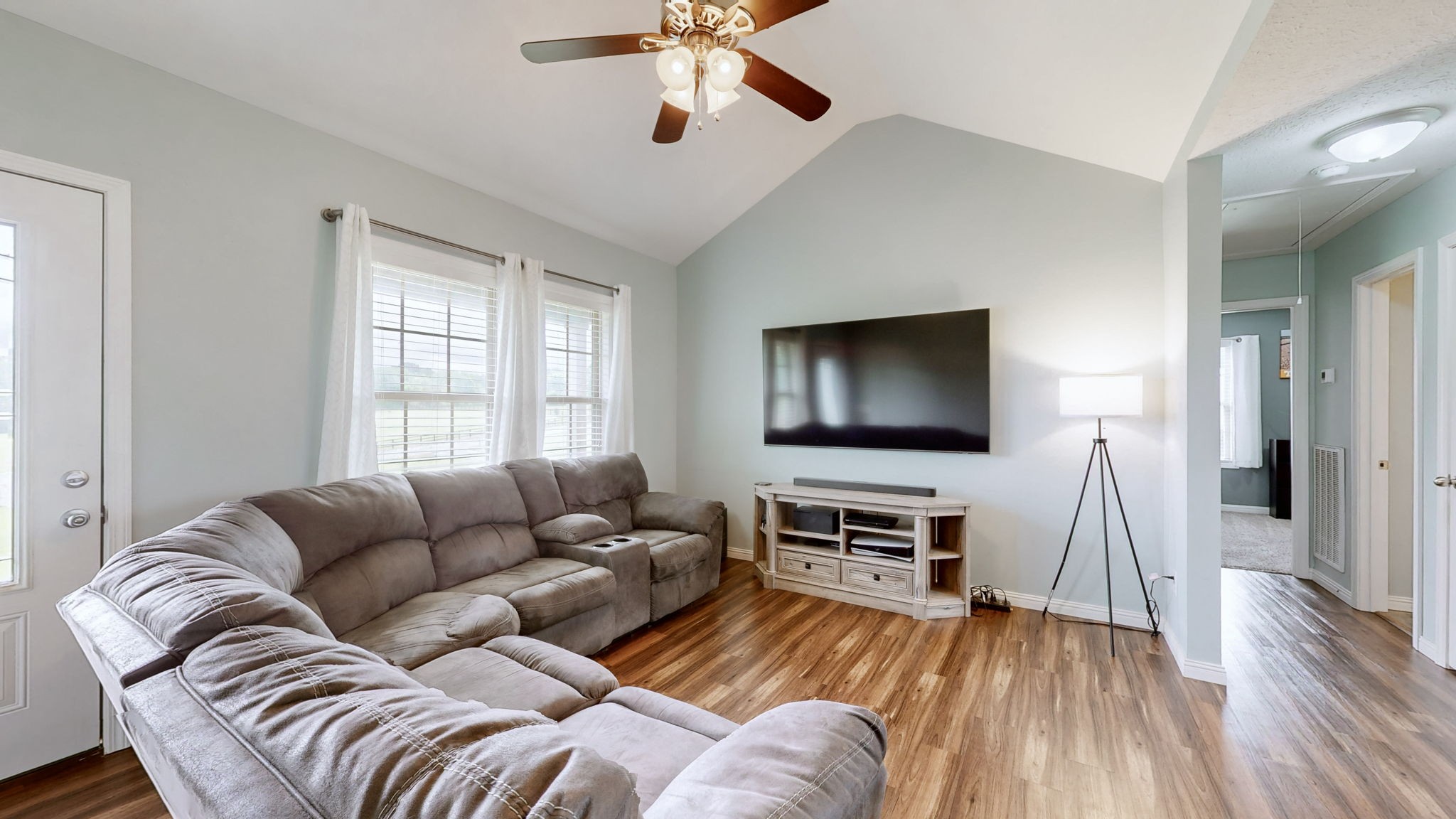 1462 East Ab Wade Road Portland, TN 37148 - Photo 6 of 52 a living room with furniture and a flat screen tv