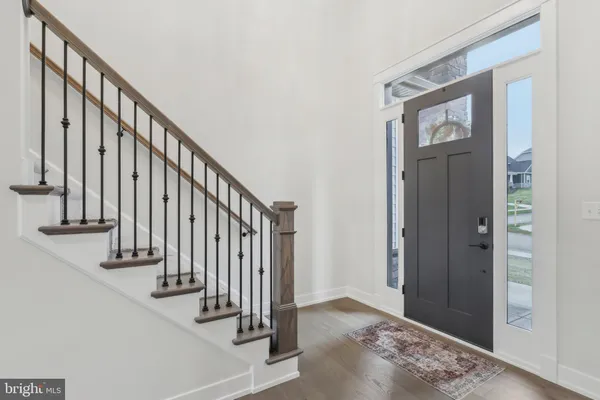a view of entryway with stairs