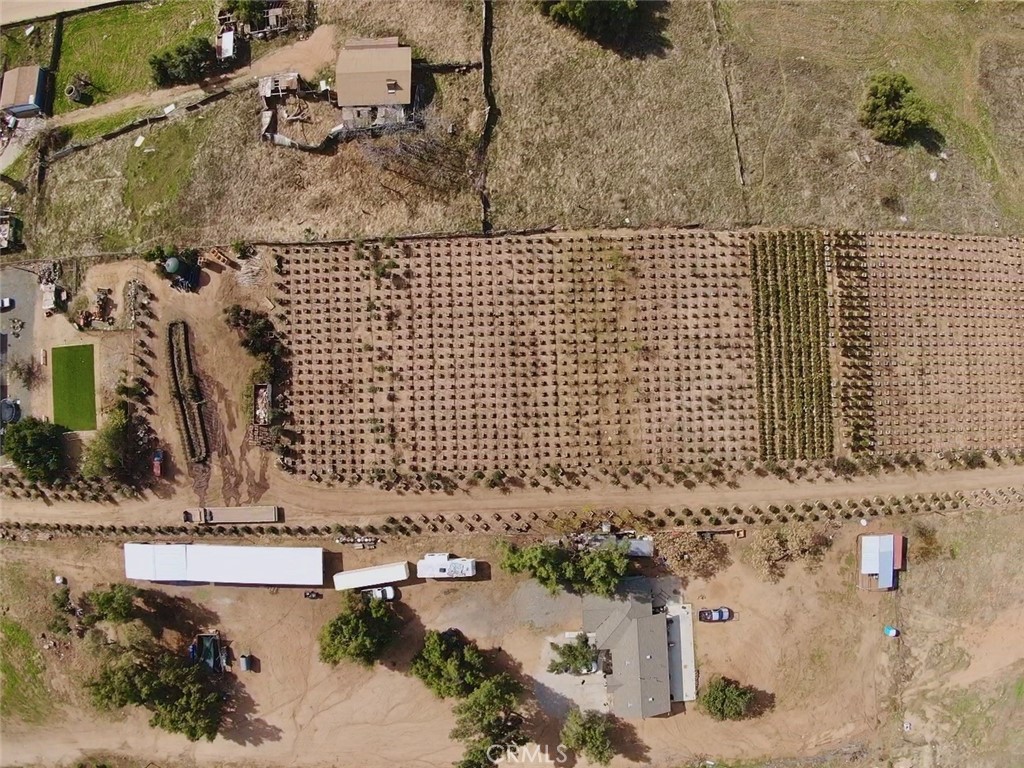 21290 Ellis Avenue Perris, CA 92570 - Photo 33 of 47 a bathroom with a bathtub and a sink