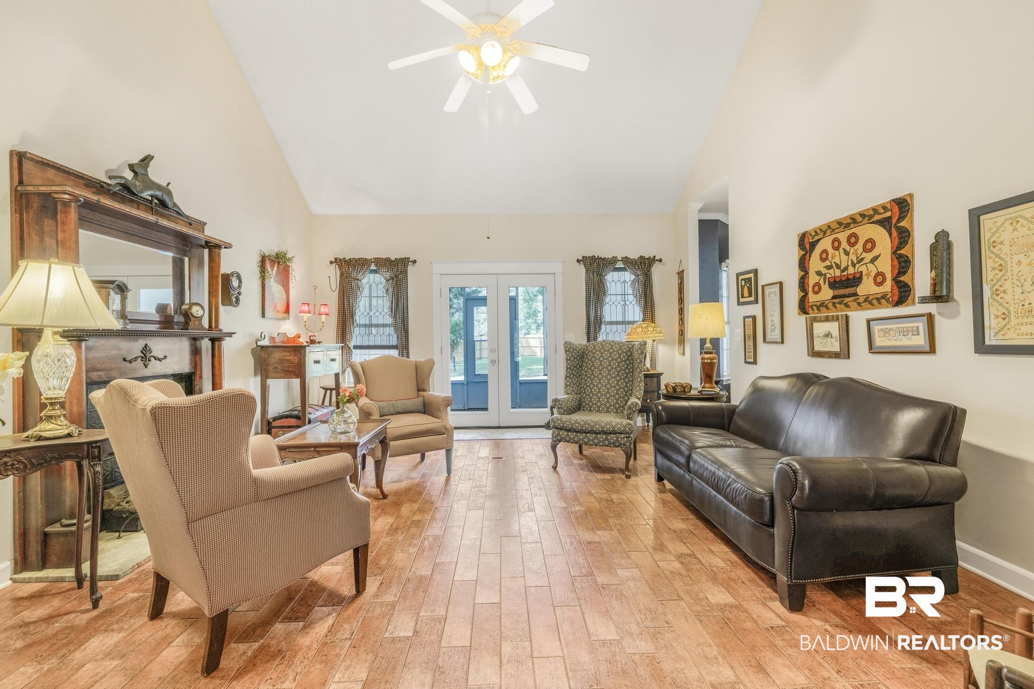 10603 Old Stage Road Stockton, AL 36579 - Photo 10 of 34 Living area with french doors, high vaulted ceiling, light wood-style flooring, and a ceiling fan
