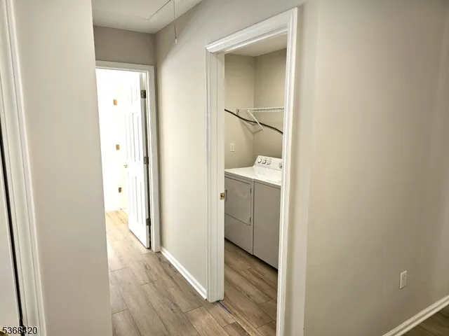 a view of a bathroom from a hallway
