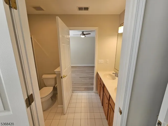 a bathroom with a sink and toilet
