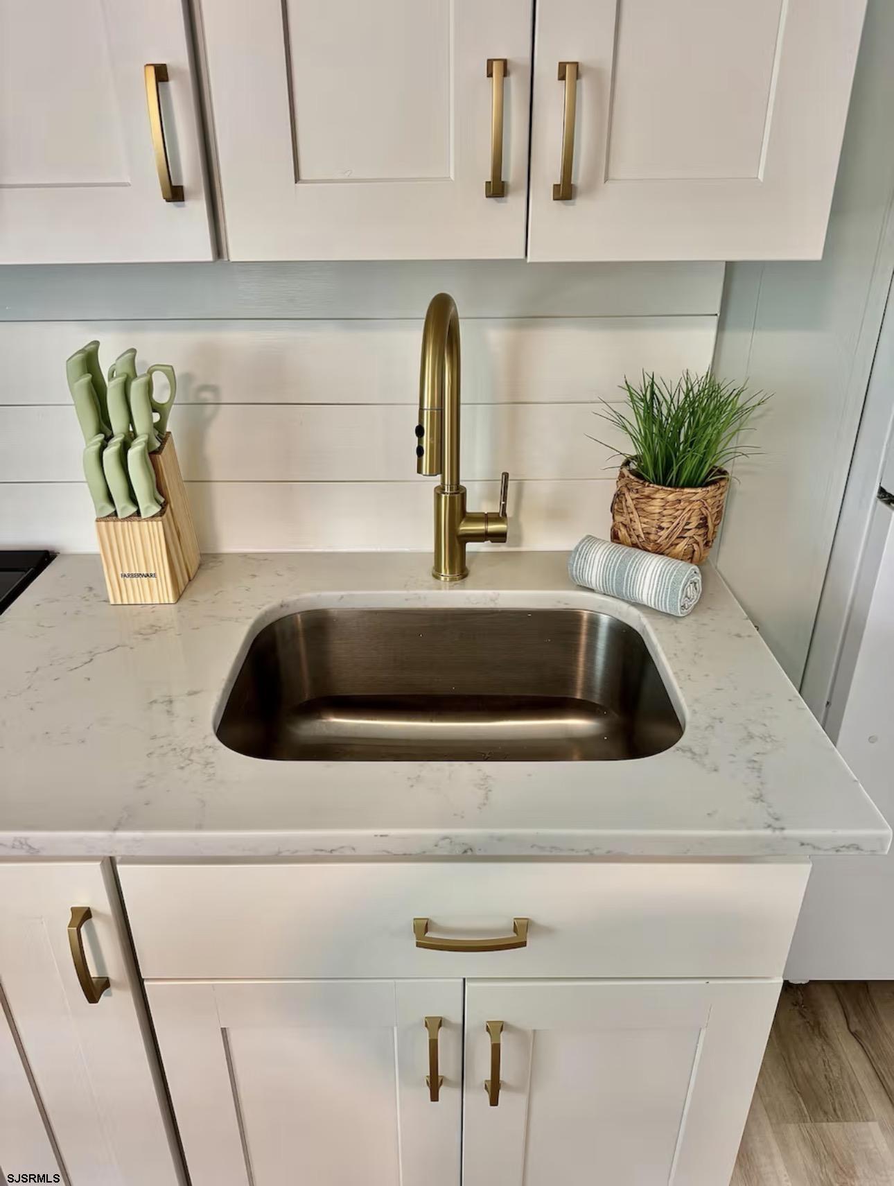 512 West Brigantine Avenue, Unit A Brigantine, NJ 08203 - Photo 14 of 26 a close view of sink and tap
