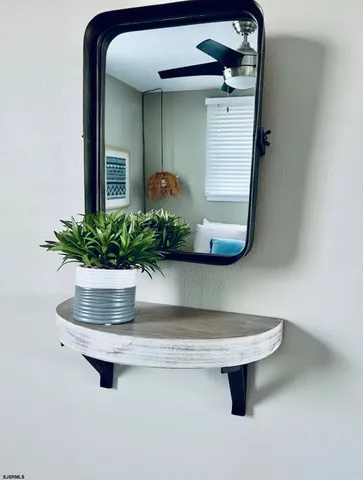 a view of a room with a potted plant