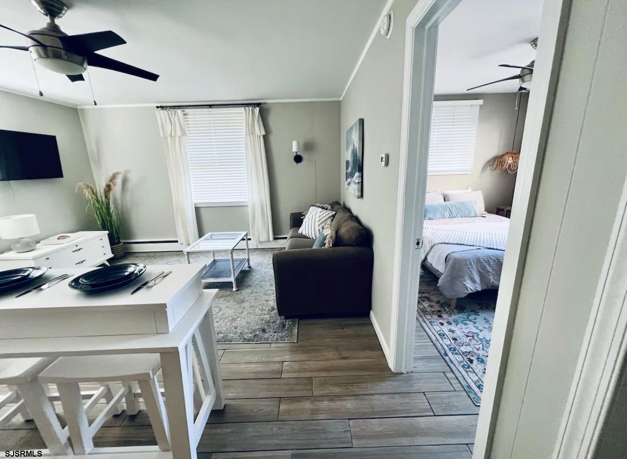 512 West Brigantine Avenue, Unit A Brigantine, NJ 08203 - Photo 4 of 26 a living room with furniture and a window