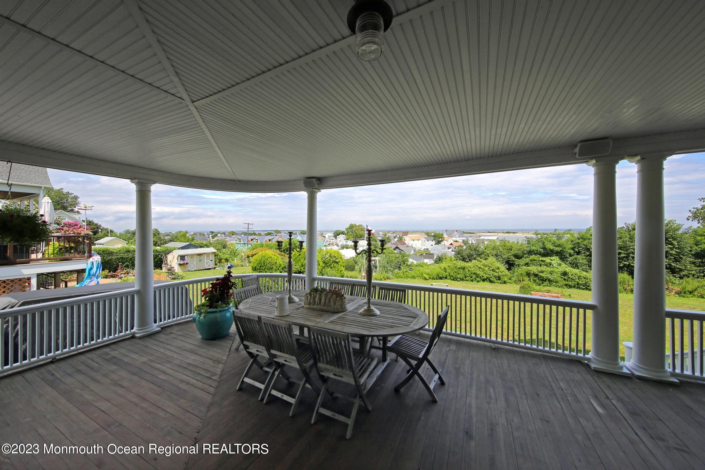 52 Navesink Avenue Highlands, NJ 07732 - Photo 12 of 71 a view of a patio with wooden floor